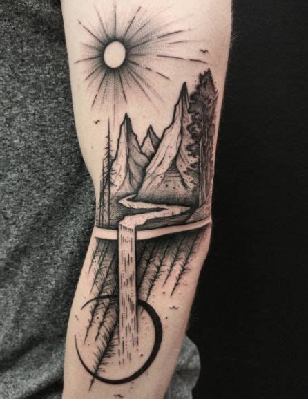 Mountains And A River Tattoo Inked On The Left Arm Tattoos For Guys