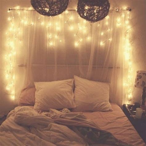 These leafy string lights turn basic fairy lights into a cool botanical accent—what more could you ask for? Bedroom Fairy Lights Headboard Design - DECOREDO
