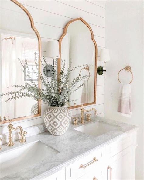 Discover round and oval shaped mirrors to bring understated simplicity or high oval black bathroom mirrors. stella-scalloped-framed-bathroom-mirror - HomeMydesign