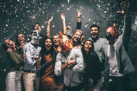 People Dancing At Party With Confetti — Stock Photo © Gstockstudio