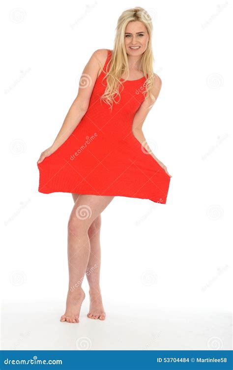 Attractive Cute Young Blonde Woman Wearing A Short Red Mini Dress Stock