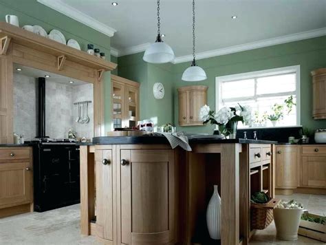 Steamed milk, and other light creamy colors, are great choices to pair with honey oak cabinets if you want to moderate the tones in the wood. Kitchen Paint Colors with Light Oak Cabinets Ideas Design ...