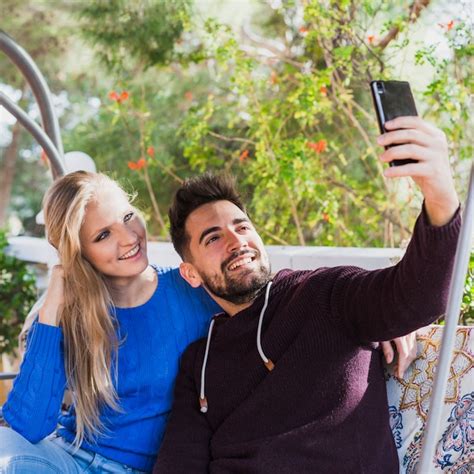 Free Photo Couple Taking Selfie And Smiling