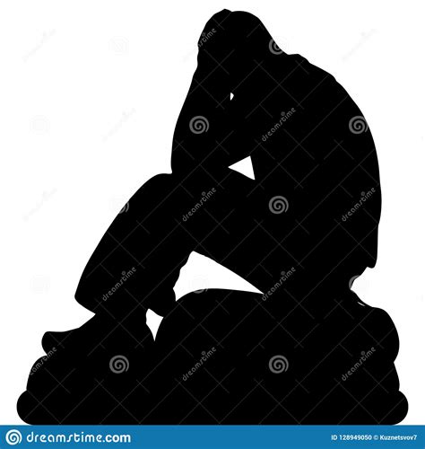 Sad Man Sitting Close Up On A Stone Holding His Hands Behind His Head