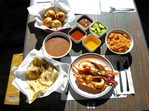 Lobster, beans, flour tortilla and salsa. Traditional dish from Puerto