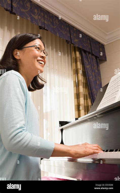 Chinese Woman Playing Piano Stock Photo Alamy