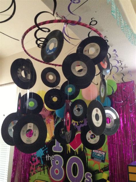 With so many ideas to choose from, the options can be overwhelming. My 80's party decorations - 45 rpm record chandelier | 80s ...