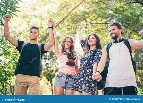 Group Of Young People Having Fun In Park Stock Photo Image Of