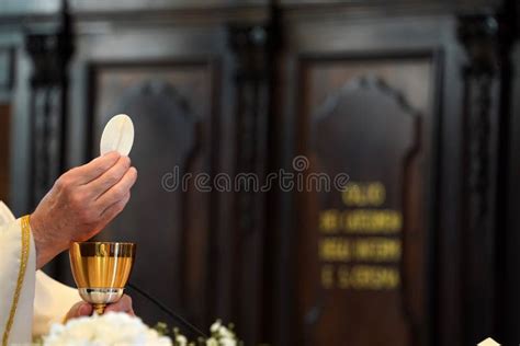 Priest Showing The Host During The Mass Stock Photo Image Of Altar