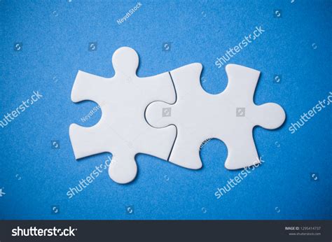 Closeup Two Connected Jigsaw Puzzle Pieces Stock Photo 1295414737