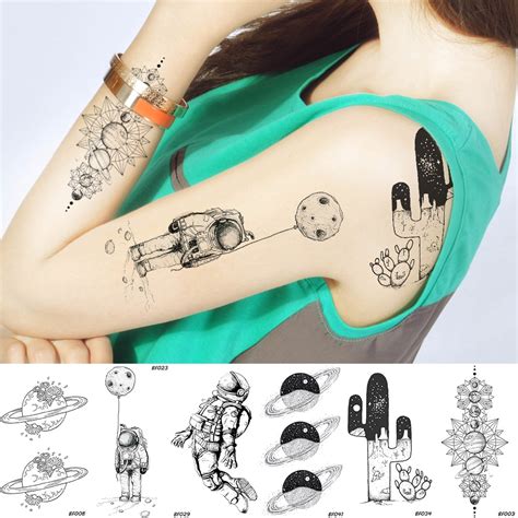 Discover the magic of the internet at imgur, a community powered entertainment destination. Space Man Temporary Tattoo Universe Spaceman Planets ...