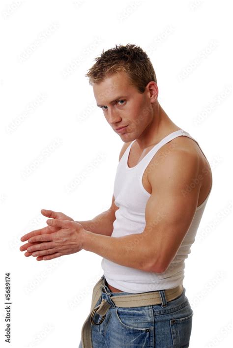 A Muscular Man Rubbing His Hands Together Stock Photo Adobe Stock