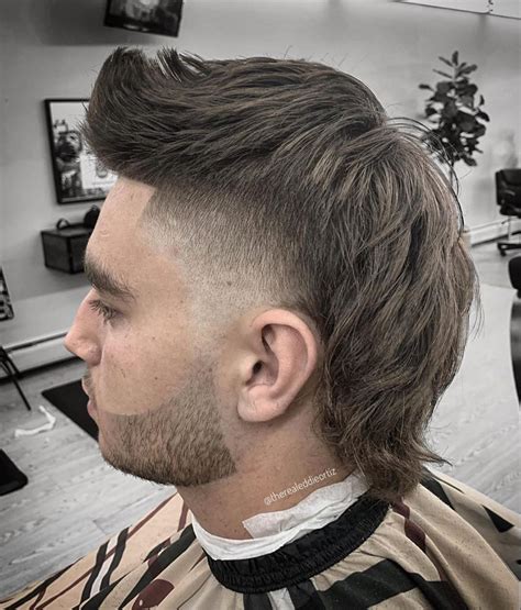 Mullet Haircut Ways To Get A Modern Mullet Men S Hairstyle Tips Mullet Haircut Mullet