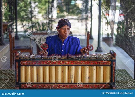 A Man Playing Gamelan An Ancient Javanese Musical Instruments