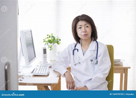 Reliable Japanese Female Doctor Stock Image Image Of Stethoscope
