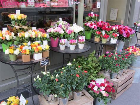 Paris flower shops en español? Paris flower stand | Flower stands, Planting flowers ...
