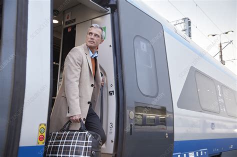 Businessman Getting Off Train Stock Image F0216259 Science Photo