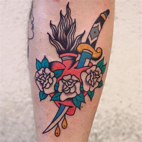 Flaming Heart And Dagger Tattoo