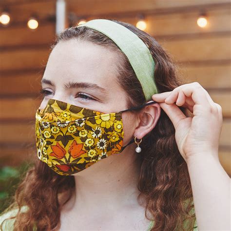 60 x reusable face masks made from medical grade fabric with certificate! Vintage Daisy Chain Fabric Washable Reusable Face Mask By Nervous Stitch | notonthehighstreet.com