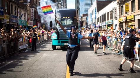 pride toronto members vote no to allowing police to march in annual parade cbc news