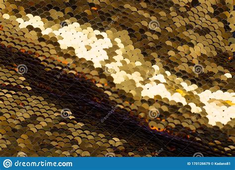 Background From Gold Glitter Paillettes Close Up Metallic Glitter