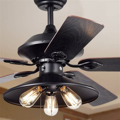 A Black Ceiling Fan With Three Light Bulbs On Its Blades And Two