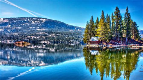 Peaceful Lake Wooden House Snow Hills Forest Pine Trees Reflected In