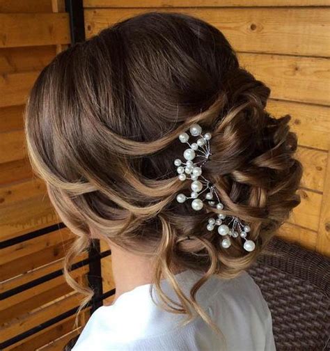 Before you sweep your hair up, create subtle curls with the ghd curve® soft curl tong. 21 Glamorous Wedding Updos for 2020 - Pretty Designs