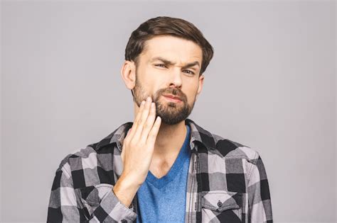 Premium Photo Toothache Concept Indoor Shot Of Young Man Feeling