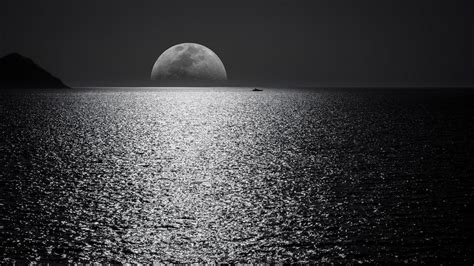 White And Black Moon With Black Skies And Body Of Water 4k