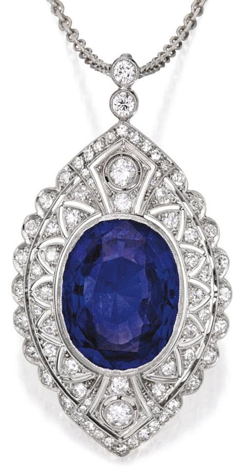 A Edwardian Platinum Sapphire And Diamond Pendant Necklace Circa 1910