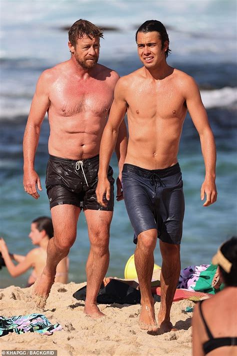 Simon Baker 52 Shows Off His Abs As He Relaxes With Son Claude Blue Baker At Bronte Beach