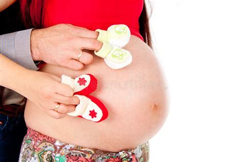 Muchachas Embarazadas Del Vientre Con Botines Imagen De Archivo Imagen De Embarazadas