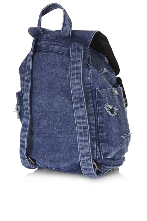 Lyst Topshop Ripped Denim Backpack In Blue
