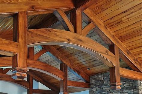 Vaulted ceiling trusses idea, ceiling is wooden color. Timberframe trusses with tongue-and-groove ceiling ...
