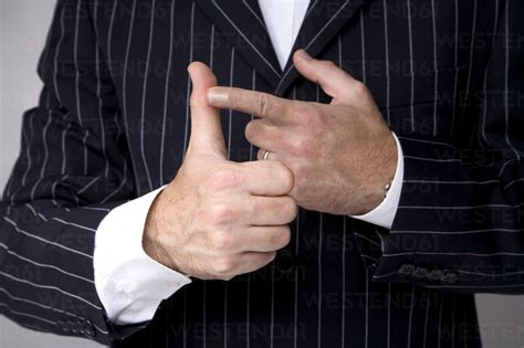 Man Making Hand Gesture Counting Close Up Stock Photo