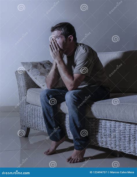 Lifestyle Dramatic Light Portrait Of Young Sad And Depressed Man