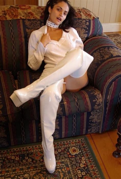 Bootstrut Barbara On Couch In White Sweater Dress And White Thigh Boots Knee High Leather Boots