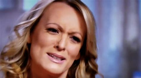 stormy daniels says she spanked trump with a magazine he was featured on