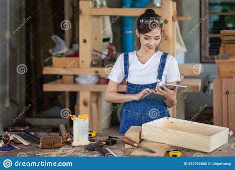Professional Carpenter A Woman Works In A Carpentry Shop Using A