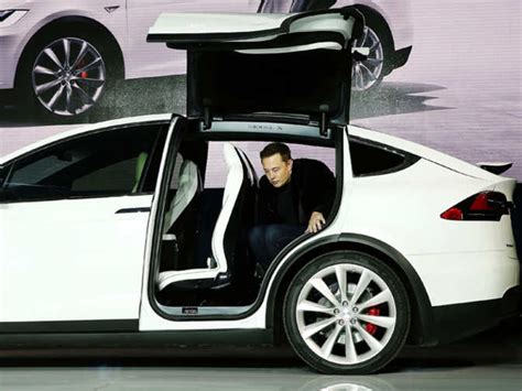 Elon Musk Delivers Teslas First Model X Electric Suvs The Economic Times