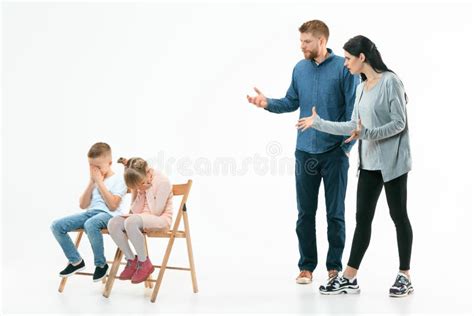 Angry Parents Scolding Their Children At Home Stock Photo Image Of