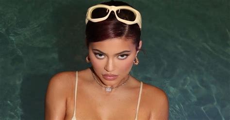 Kylie Jenners Boobs Spill Out Of Skimpy Bikini As Top Struggles To