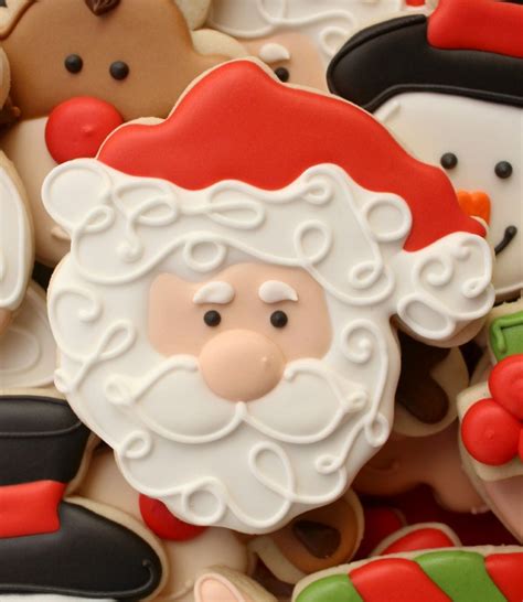 See more ideas about christmas cookies, cookie decorating, cookies. Decorated Santa Cookies - The Sweet Adventures of Sugar Belle