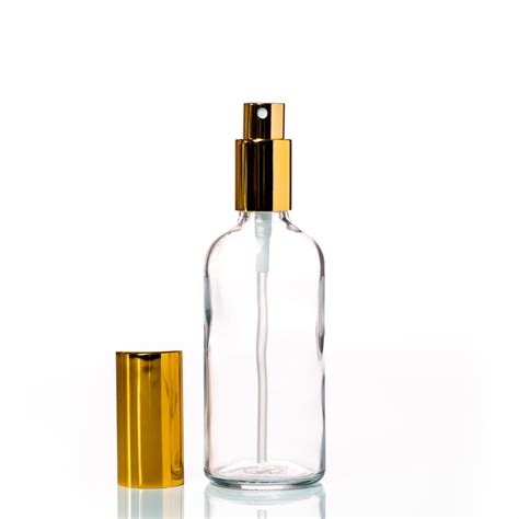 Euro 100ml Clear Glass Bottle With Aluminium Gold Spray Cap Assembly Wholesale Aroma Supplies
