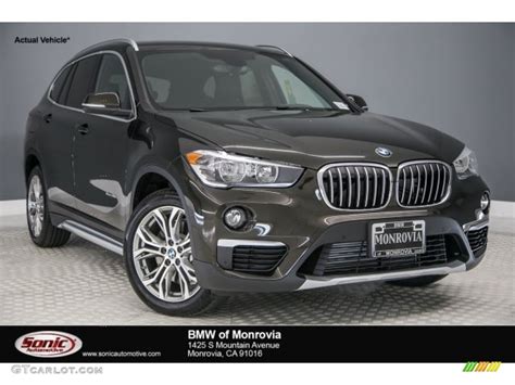 We have run flat tires for added safety and smoothest driving dynamics for better comfort. 2017 Dark Olive Metallic BMW X1 xDrive28i #120018327 Photo #4 | GTCarLot.com - Car Color Galleries