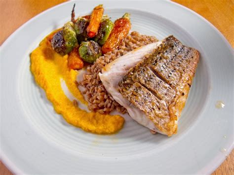 Gavin S Cooking Striped Sea Bass With Roasted Vegetables Wheat Berries And Carrot Puree