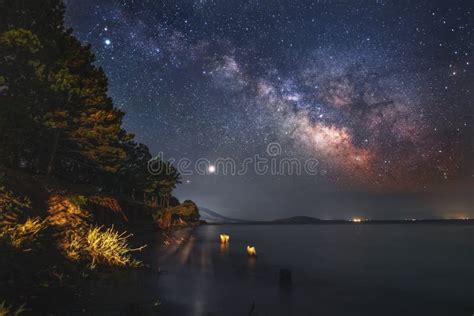 Beautiful Starry Sky With Bright Milky Way Galaxy Over The Lake Night