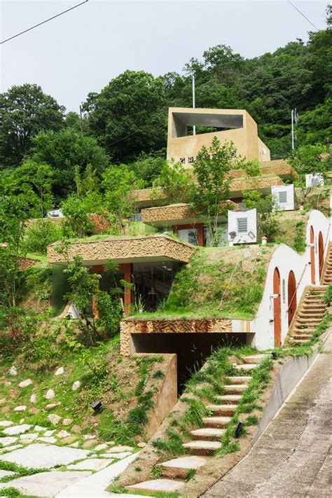Greendo Undulating Geothermal Homes Built Into The Side Of A Mountain