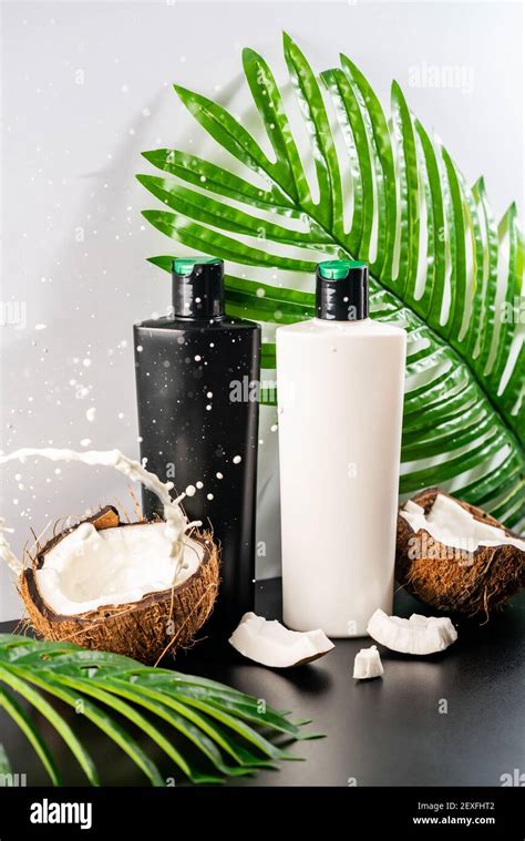 Bottles Of Hair Shampoo And Conditioner With Fresh Organic Coconut